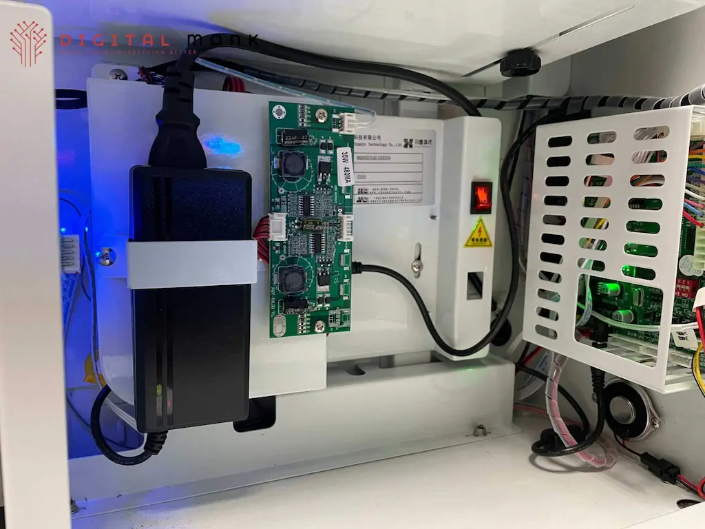 Raspberry Pi control board and payment electronics inside the BudKoin vending machine, built by DigitalMonk