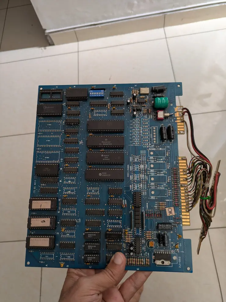 Older Motorola 6821-based video poker game board with CRT controller and 2764 EPROMs.
