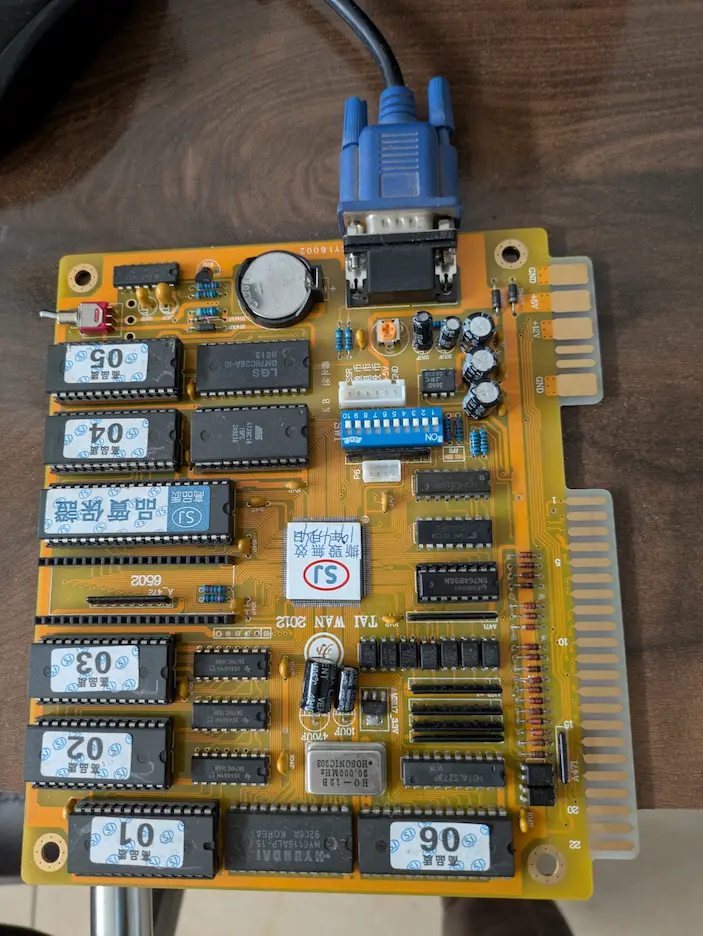 Original Tai Wan-era video poker game board with VGA output and through-hole EPROMs — the hardware DigitalMonk replaced.
