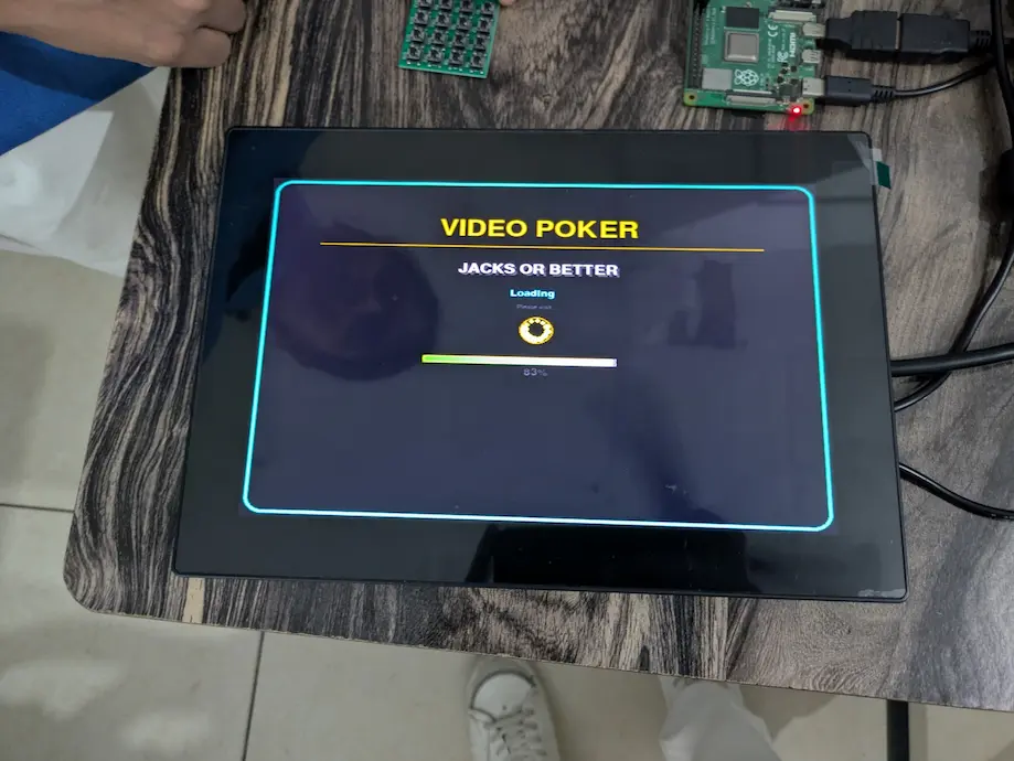 Video poker Jacks or Better loading screen on Raspberry Pi 4 — game software rewritten from scratch.